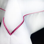 Obrus Veneto Bianco - fuksjowa lamówka