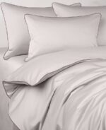 Pościel satynowa SAN ANTONIO - perłowy beż z brązową lamówką